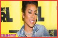 Keyshia Cole sends retro vibes in colorful, skimpy two-piece with a big afro wig in new photos